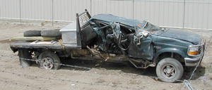 This pickup pulling a horse trailer was hit by a semi truck last Thursday.