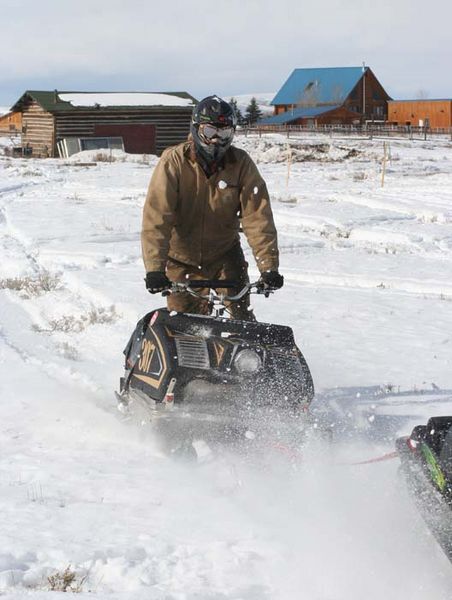 307 gets a tow. Photo by Clint Gilchrist, Pinedale Online.