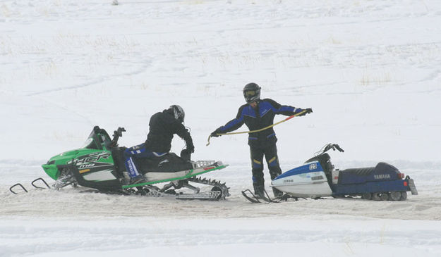 129 gets a tow. Photo by Dawn Ballou, Pinedale Online.