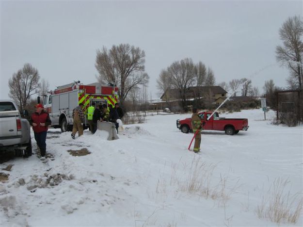 Testing hoses. Photo by T.J. Hunt.