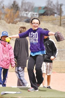 Heeere, batter, batter. Photo by Andrew Setterholm, Sublette Examiner.