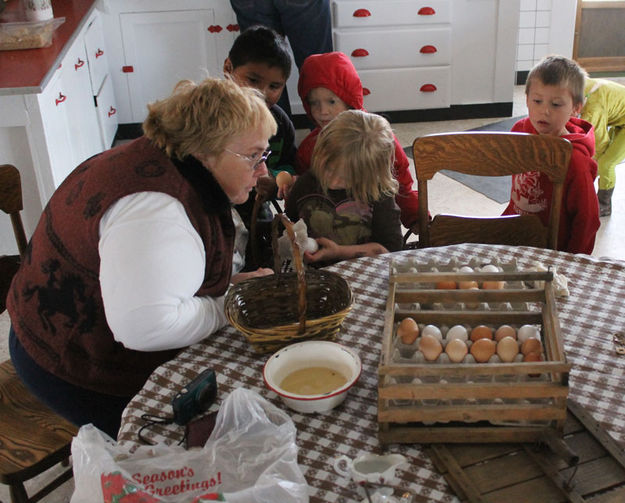 Cleaning eggs. Photo by Clint Gilchrist, Pinedale Online.