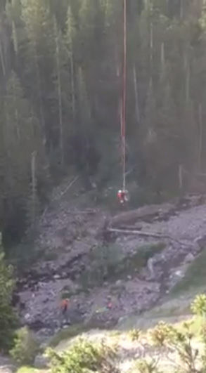 Hoisting him up. Photo by Tip Top Search & Rescue.