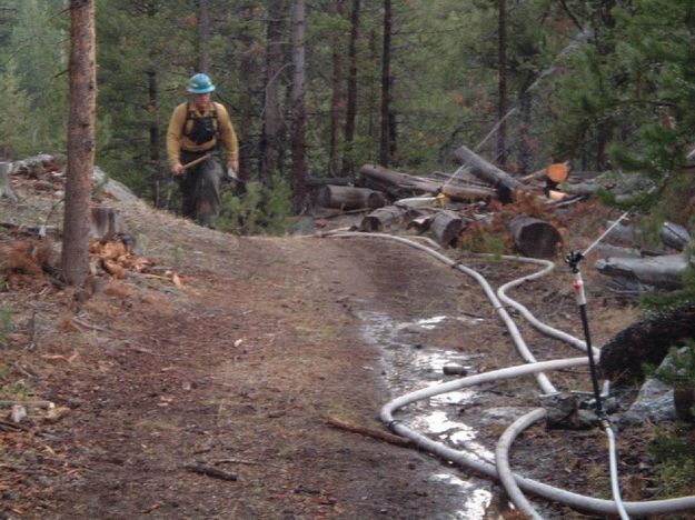 Monitoring Sprinklers. Photo by U.S. Forest Service.