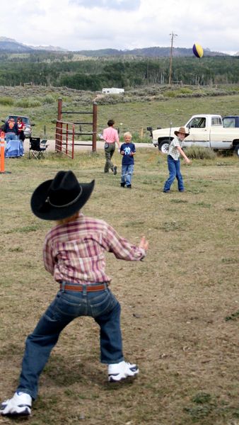 Tossing the Football. Photo by Pam McCulloch.