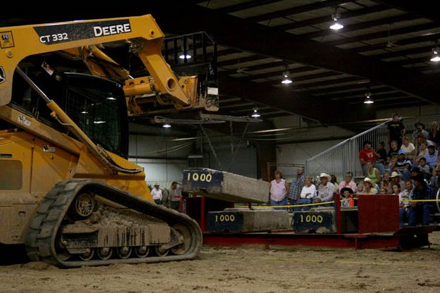 Adding more weight. Photo by Dawn Ballou, Pinedale Online.