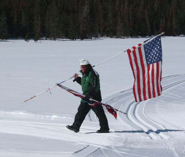 Courtney walks the flag. Photo by Mindi Crabb.