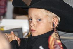 Black tie and blue eyes. Photo by Megan Rawlins, Pinedale Roundup.