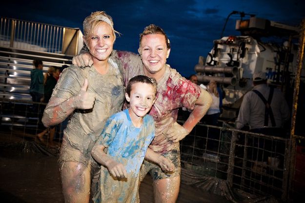 Muddy but happy. Photo by Tara Bolgiano, Blushing Crow Photography.