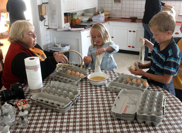 Helping with the eggs. Photo by Pinedale Online.