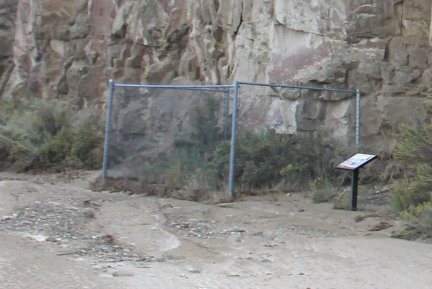 Fenced historical marker. Photo by Dawn Ballou, Pinedale Online.