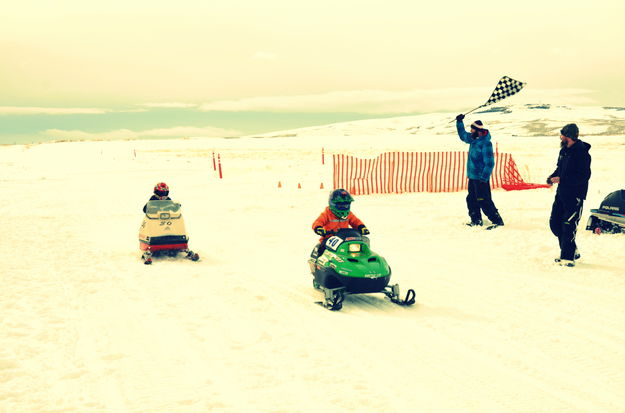 Taking the Checkered Flag. Photo by Terry Allen.