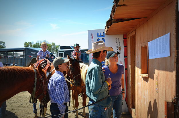 Checking the Roster. Photo by Terry Allen.