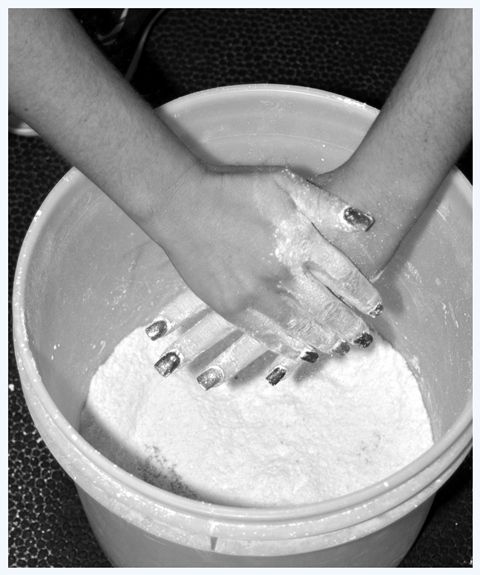 Hands in Talc. Photo by Terry Allen.