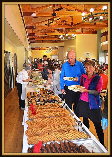 Rick and Sue in Food Line. Photo by Terry Allen.