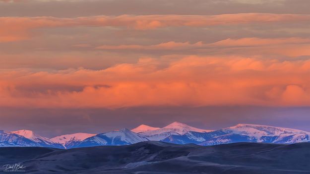 Morning Sunrise Glow On Wyoming Peak. Photo by Dave Bell.